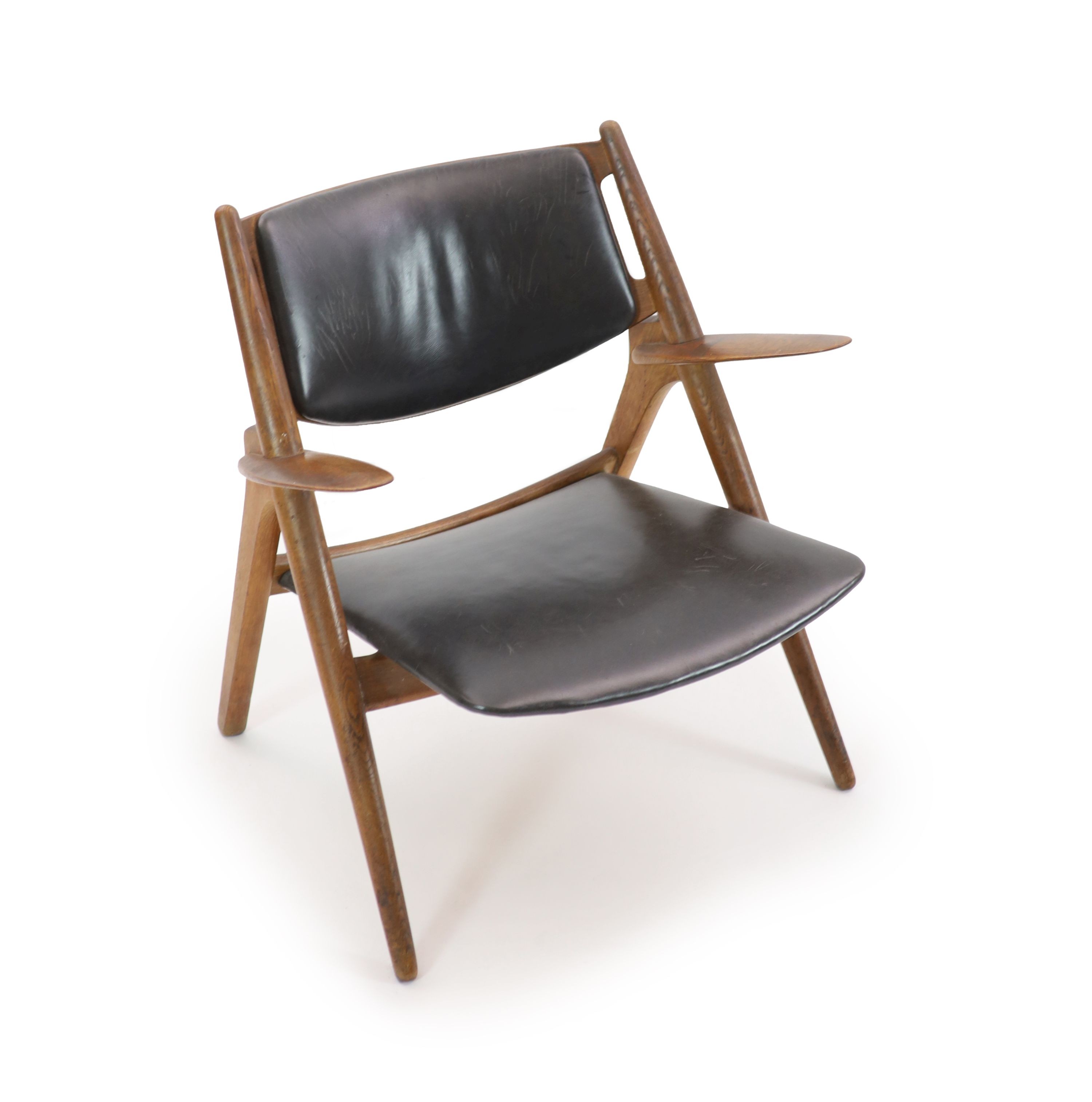 A Hans Wagner for Carl Hansen & Son oak and plywood armchair W.74cm D.64cm. H.77cm.